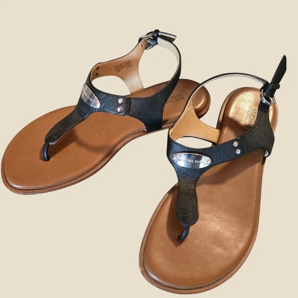 Michael Kors T Strap Flat Sandals Black Leather Logo Plate Women's Size‎ 8.5
